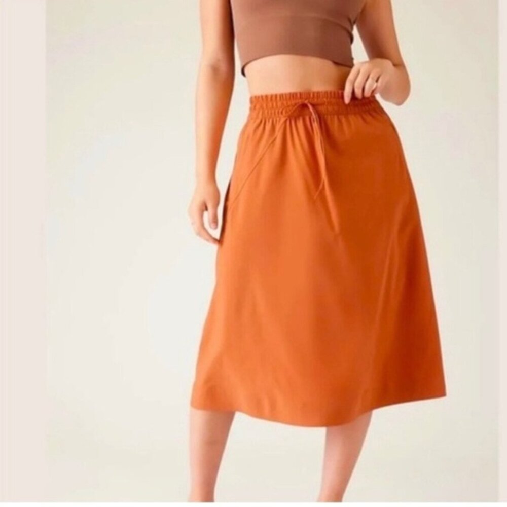 Athleta Arrival Skirt Orange Midi Length Lightweight Pockets Size 6
